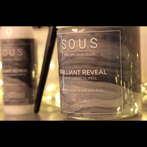 Screenshot still from Kalley’s Last Review (2018, short horror film). A beauty vlogger films herself applying a chemical peel. Used for commentary in a Hallowe’en body horror blog.