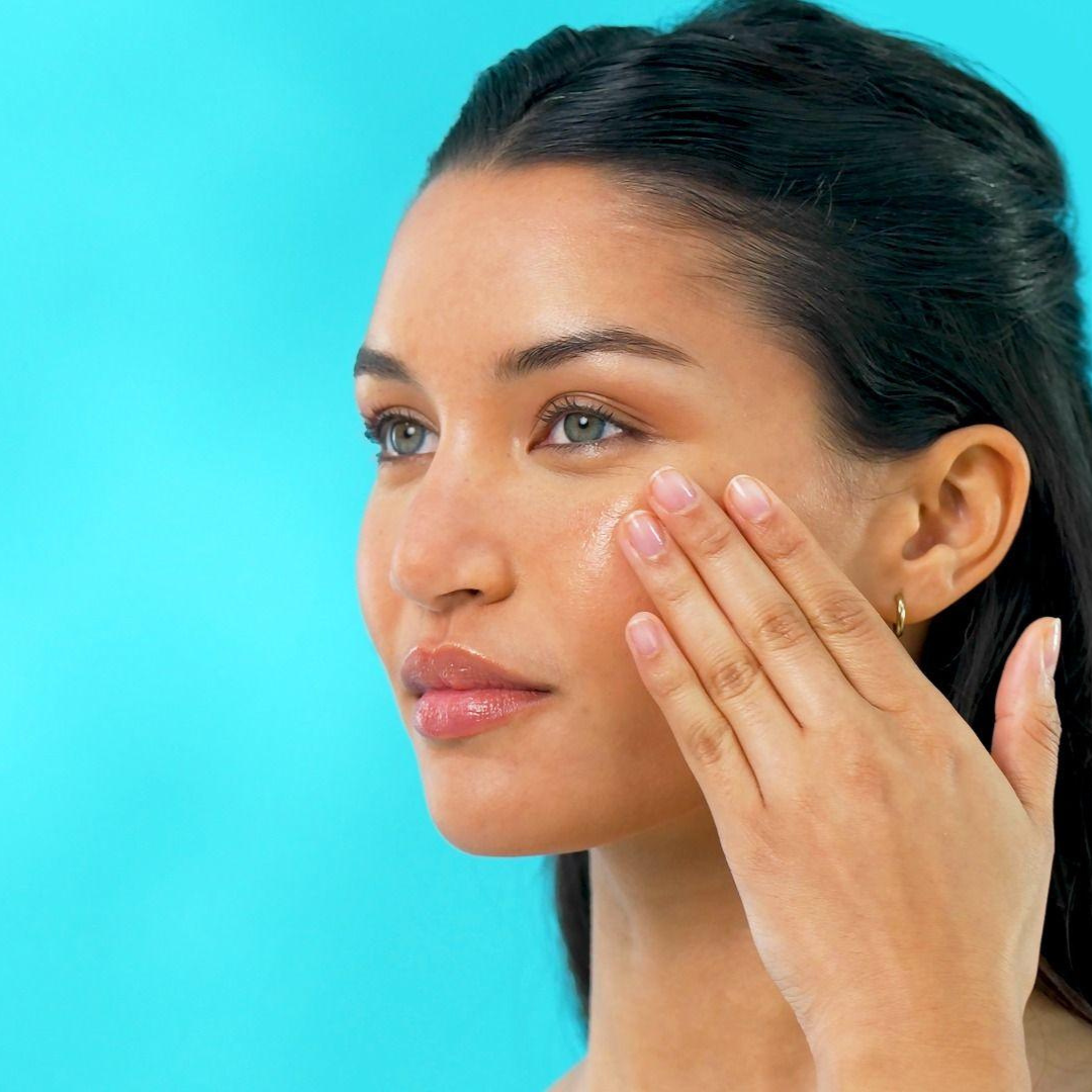Official TEMPLESPA screen capture from a how-to video showing a model applying TEMPLESPA LET’S CONCENTRATE Skin Glowing Serum as part of a glowing skin routine